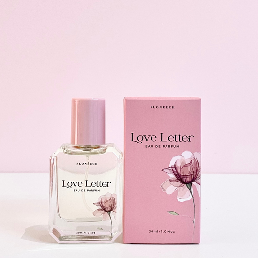 Love Letter Perfume bottle next to its pink box